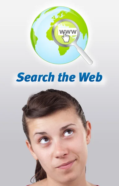 Young girl looking at internet type of icons — Stock Photo, Image