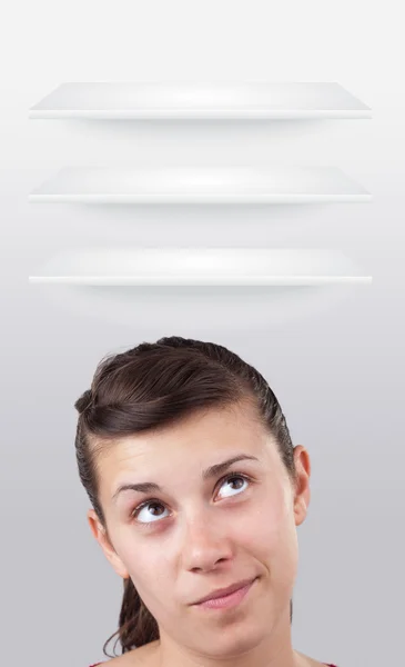 Young girl looking at white copyspace — Stock Photo, Image