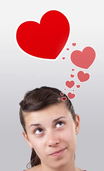 Ung tjej söker kärlek typ av ikoner — Stockfoto