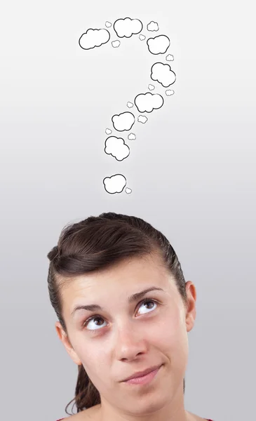 Young head looking at white marks — Stock Photo, Image