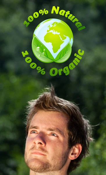 Young head looking at green eco sign