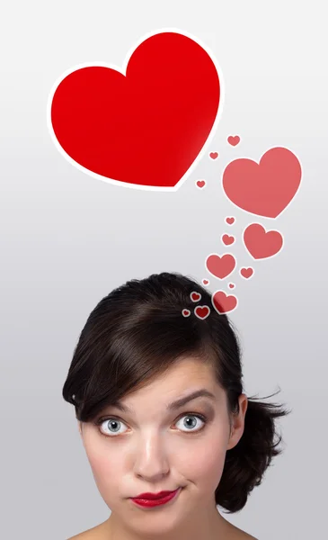 Ung tjej söker kärlek typ av ikoner Stockbild