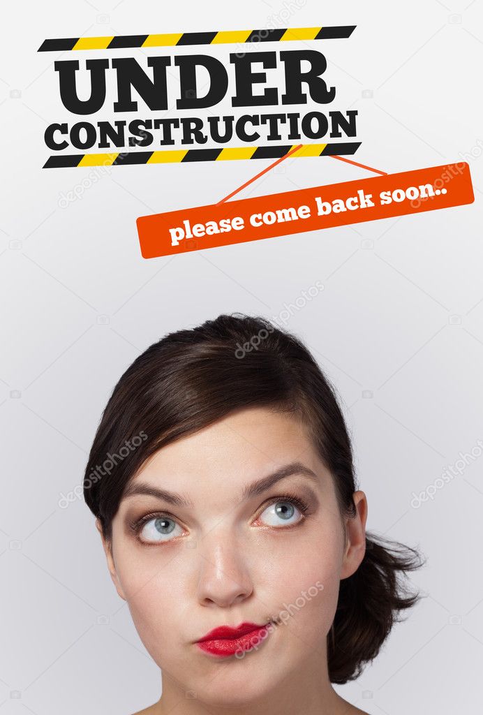 Young girl looking at contruction icons