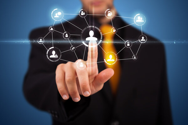 Businessman pressing modern social type of icons