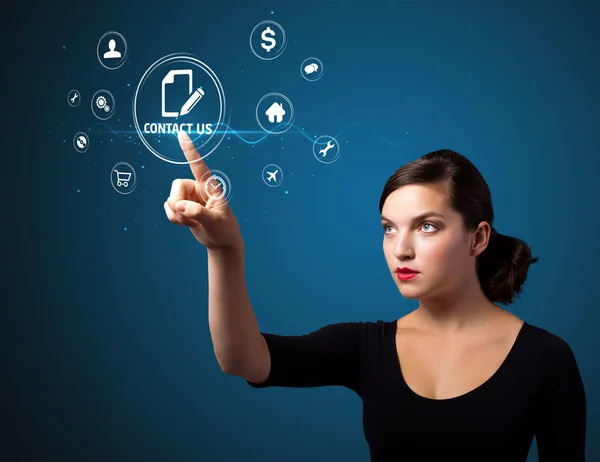 Businesswoman pressing virtual messaging type of icons — Zdjęcie stockowe
