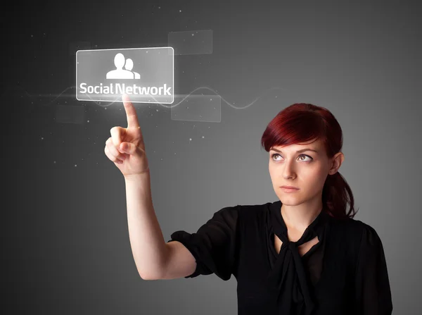 Businesswoman pressing modern social type of icons — Zdjęcie stockowe
