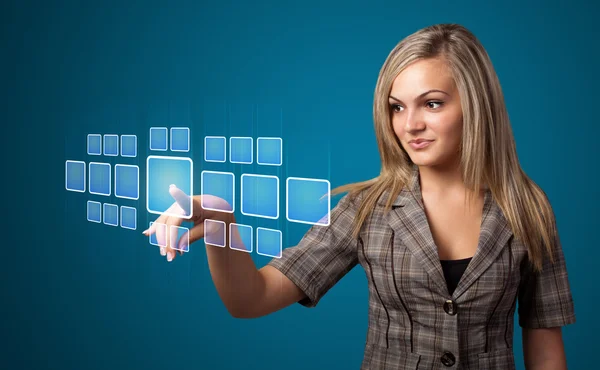 Businesswoman pressing high tech type of modern buttons — Stock Photo, Image