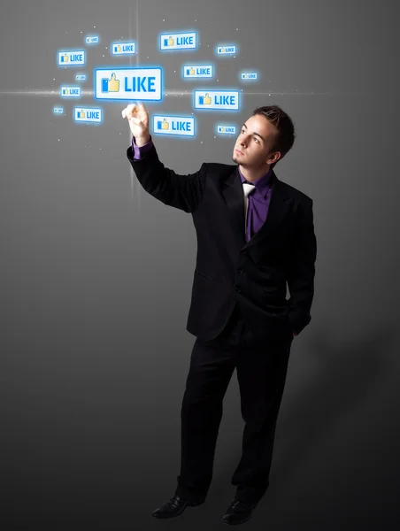 Uomo d'affari premendo moderno tipo sociale di icone — Foto Stock
