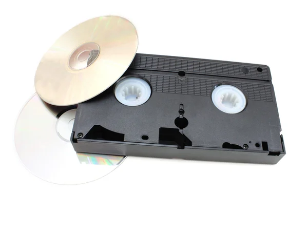 DVD диски и VHS видео картридж — стоковое фото
