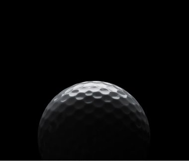 Golf ball on black background with copy space clipart