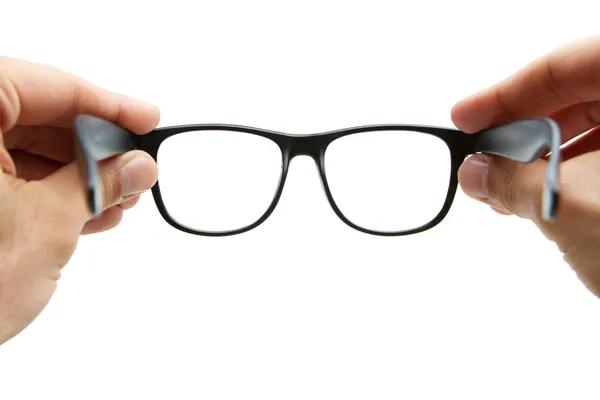 レトロなスタイルの眼鏡を保持している人間の手 — ストック写真