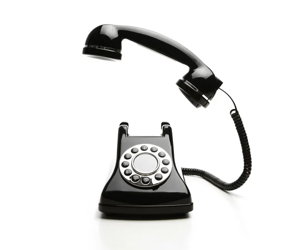 Gamla gammaldags telefon på vit bakgrund — Stockfoto
