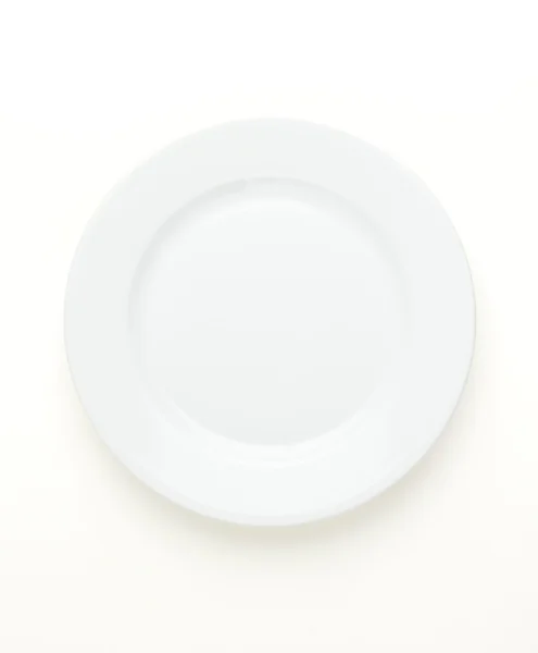 Assiette vide sur blanc — Photo