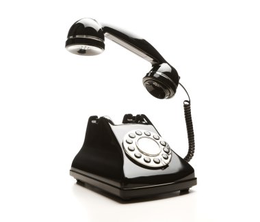 Retro telephone on white background clipart