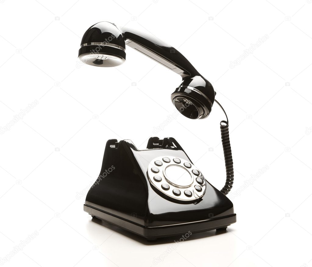 Retro telephone on white background