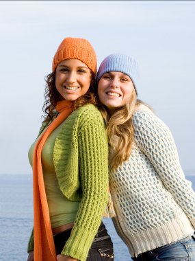 Teen girls, happy smiles on vacation clipart