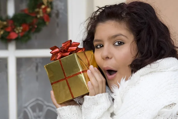 Excited girl with surprise gift or present — Stock Photo, Image