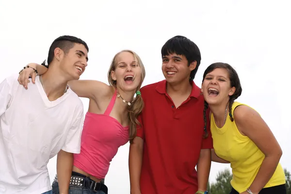 Group of friends laughing, happy teenagers Stock Photo