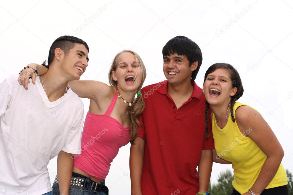 Group of friends laughing, happy teenagers