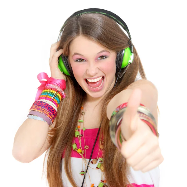 Adolescente con auriculares y pulgares hacia arriba —  Fotos de Stock