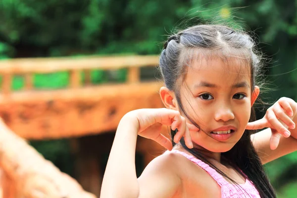 Portrait of a beautiful young girl looking happy — Stock Photo, Image