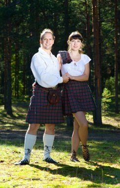 Man and woman in scottish costume clipart