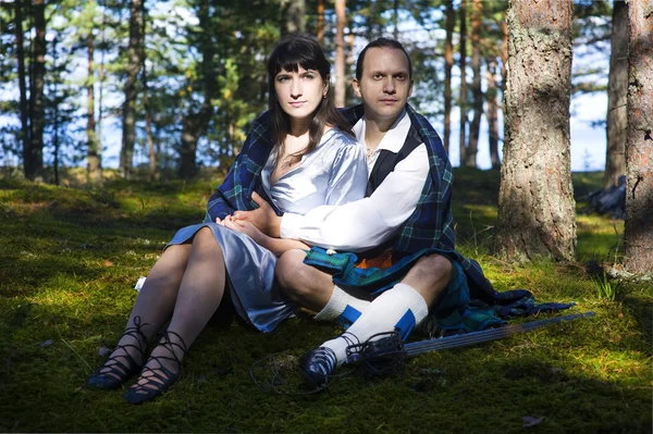 Woman and man in scottish costume — Stock Photo, Image