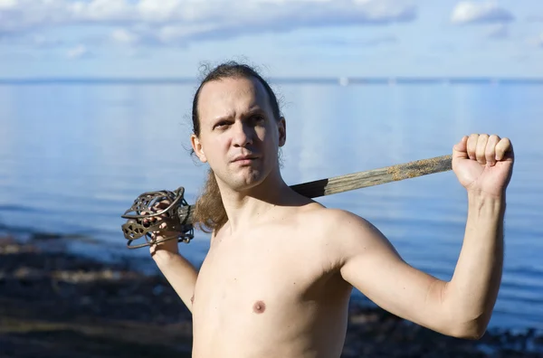 Man with naked torso with sword — Stock Photo, Image
