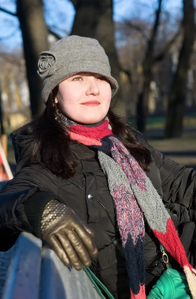 Smiling beautiful woman in the hat and scarf — Stok fotoğraf