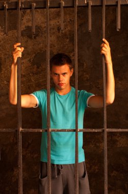 Man behind the bars clipart