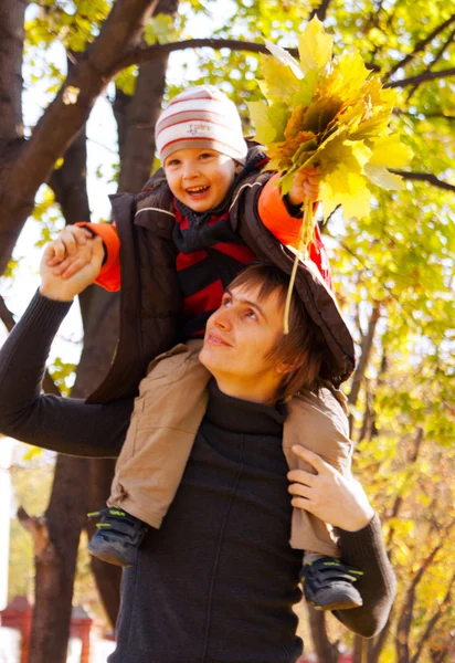 Happy father and son at fall time — Stock Photo, Image