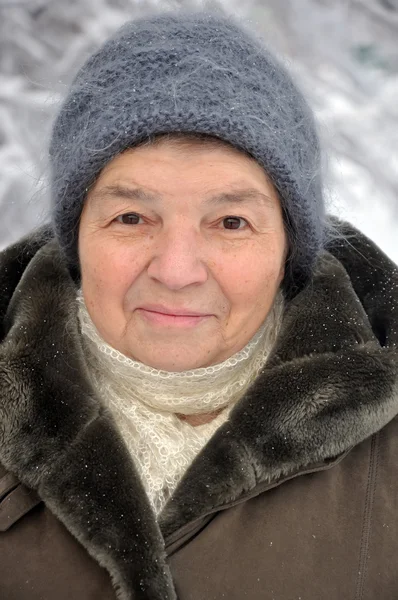 stock image Portrait of a old woman in winter