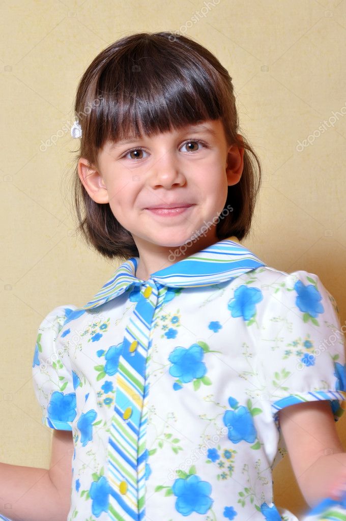 Portrait of a cute girl in dress