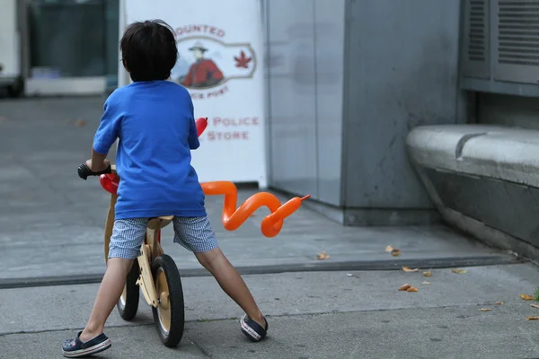 A boy on the bike — Stock Photo, Image