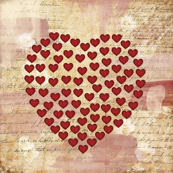 Corazón sobre un papel vintage — Foto de Stock