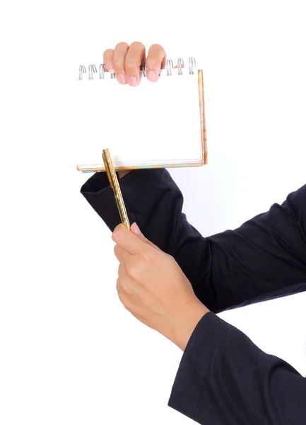 Hand hält den Stift und zeigt auf Notizbuch — Stockfoto