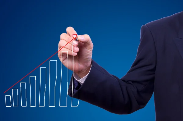 Business man hand drawing graph — Stock Photo, Image