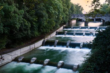 Cascades at the isar in munich clipart