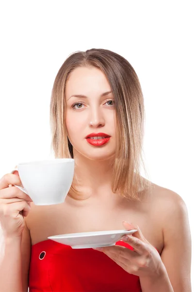 Junge attraktive blonde Frau trinkt Tee — Stockfoto