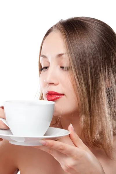 Joven mujer rubia atractiva bebiendo té — Foto de Stock