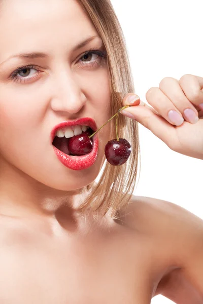Young woman's mouth with red cherries — Stock Photo, Image