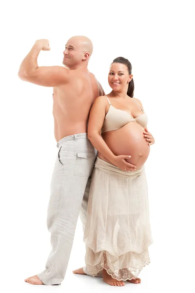 Boldog terhes nő a férjével. — Stock Fotó