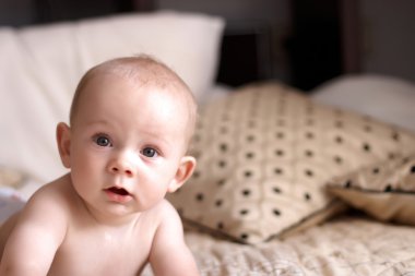 A baby learning to crawl clipart