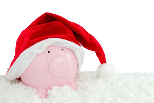 Santa Claus piggy bank on snow — Stock Photo, Image