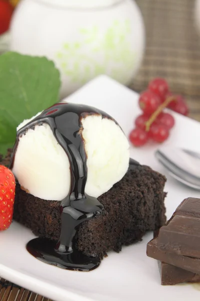 Brownie with ice cream on the dish — Stock Photo, Image