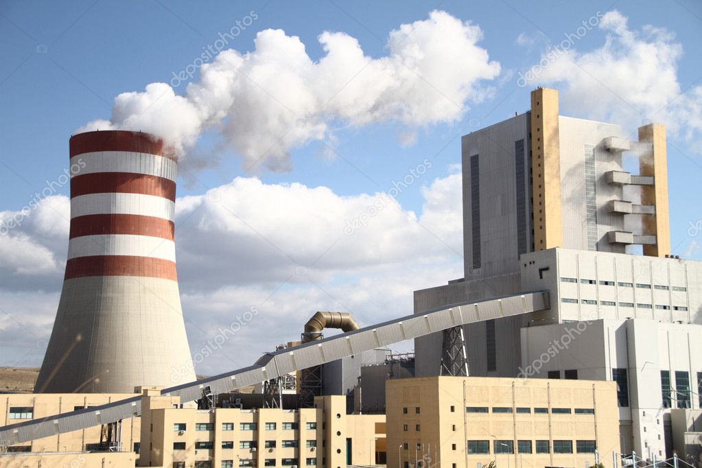 Power plant with smoking chimney