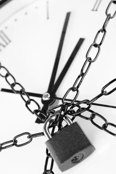 stock image Clock bound with chain and padlock