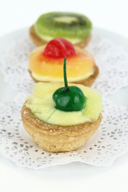 Creamy dessert tarts with fruits