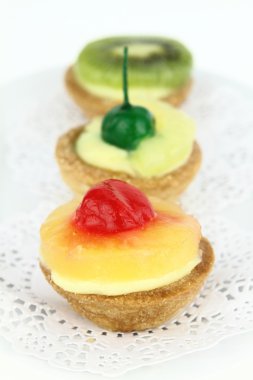 Creamy dessert tarts with fruits