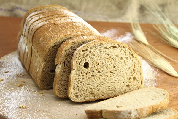 Loaf of fresh sliced bread — Stock Photo, Image